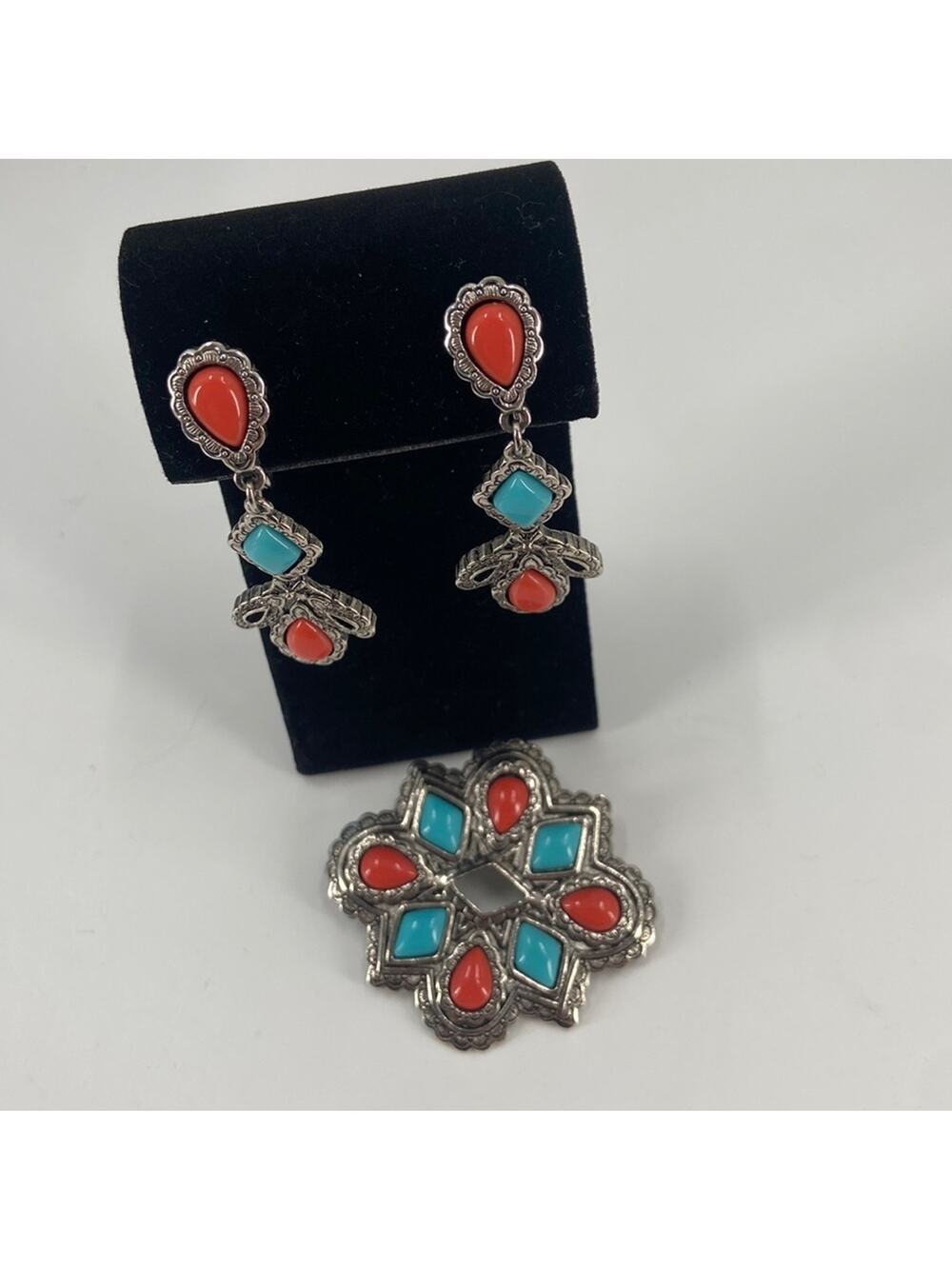 Avon tribal clip on earrings and brooch set